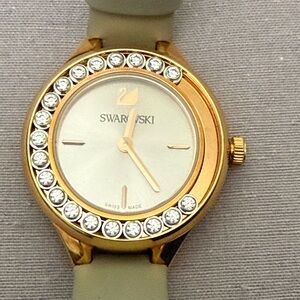 Swarovski Gold-Tone Watch with Gray Strap